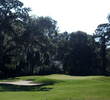 On the Hills Course at Palmetto Dunes Resort, the par-4 fifth hole's green is tucked behind two trees, so placement from the tee is a priority.