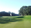 The par-5 fourth hole on Palmetto Dunes Resort's Oceanfront Course is a dogleg left to an elevated green.