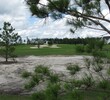 The Golf Club at Hilton Head Lakes employs a lot of waste bunkers to punish errant shots, such as this one on No. 9.