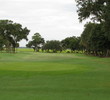 The third hole of the Cotton Dike golf course is a dogleg left to a narrow opening onto the green.