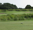 The par-3 sixth hole at Morgan River at Dataw Island Golf Course puts a lovely little pond between the tees and the green.