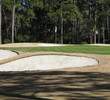 Oyster Reef Golf Club's third hole sits amid a ring of bunkers. Fortunately, it's a large green. 