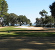 Oyster Reef Golf Club's signature sixth hole is a fierce par 3 with bunkers surrounding the green. And there's a sharp drop on the right side, the direction a prevailing winds will push your shot.