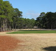 A typical tee shot at Oyster Reef Golf Club must thread through the trees.