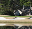 The par-3 16th par presents an intimidating approach over water and sand at Oyster Reef Golf Club.
