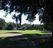 Sand and overhanging branches put perils on the ground and in the air, including the 11th hole, at Robber's Row at Port Royal Golf Club.