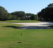 Sand nearly surrounds the elevated green on the par-3 15th hole at Robber's Row at Port Royal Golf Club.