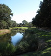 Water runs along the left side of the par-3 eighth hole, which stretches 171 yards from the tips, at Robber's Row at Port Royal Golf Club.