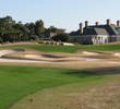 The approach to the 15th hole on the Nicklaus course at Colleton River Plantation Club requires a deft shot over bunkers to an offset green.