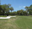 Bunkers and trees make the left side a bit tricky on the par-5 second hole on the Dye course at Colleton River Plantation.