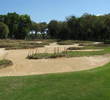 The landscape is stark between tee and green on the par-3 sixth hole on the Dye course at Colleton River Plantation.