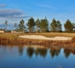 Water guards the seventh green at the Golf Club at Hilton Head Lakes in Hardeeville, South Carolina. 