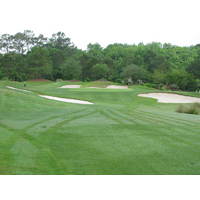 The fifth hole at Crescent Pointe Golf Club mixes it up by putting the green below your feet.