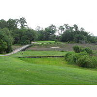 The ninth green at Crescent Pointe Golf Club, pushed into the marsh, is a highlight of the course.