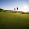 A sunny day view of a hole from Harbour Town Golf Links at Sea Pines Resort.