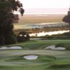 A view of a green surrounded by sand traps at West from Belfair Golf Club