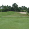 View of a green and bunker at Crescent Pointe Golf Club