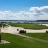 A view of the 16th hole surrounded by sand traps at Colleton River Club.